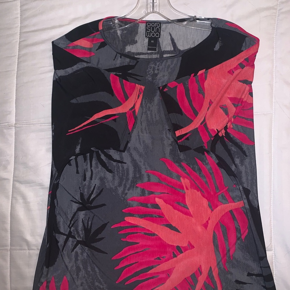 Clara Sun Woo, floral top with light material.